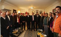 MHP’den tam kadro esnaf ziyareti