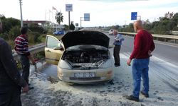 Seyir halinde alev alan otomobil söndürüldükten sonra tekrar yanmaya başladı