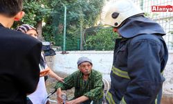 Yaşlı çiftin yardımına komşuları koştu