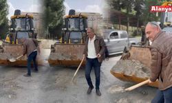 MHP'li Balta çukurları kürekle kapattı!